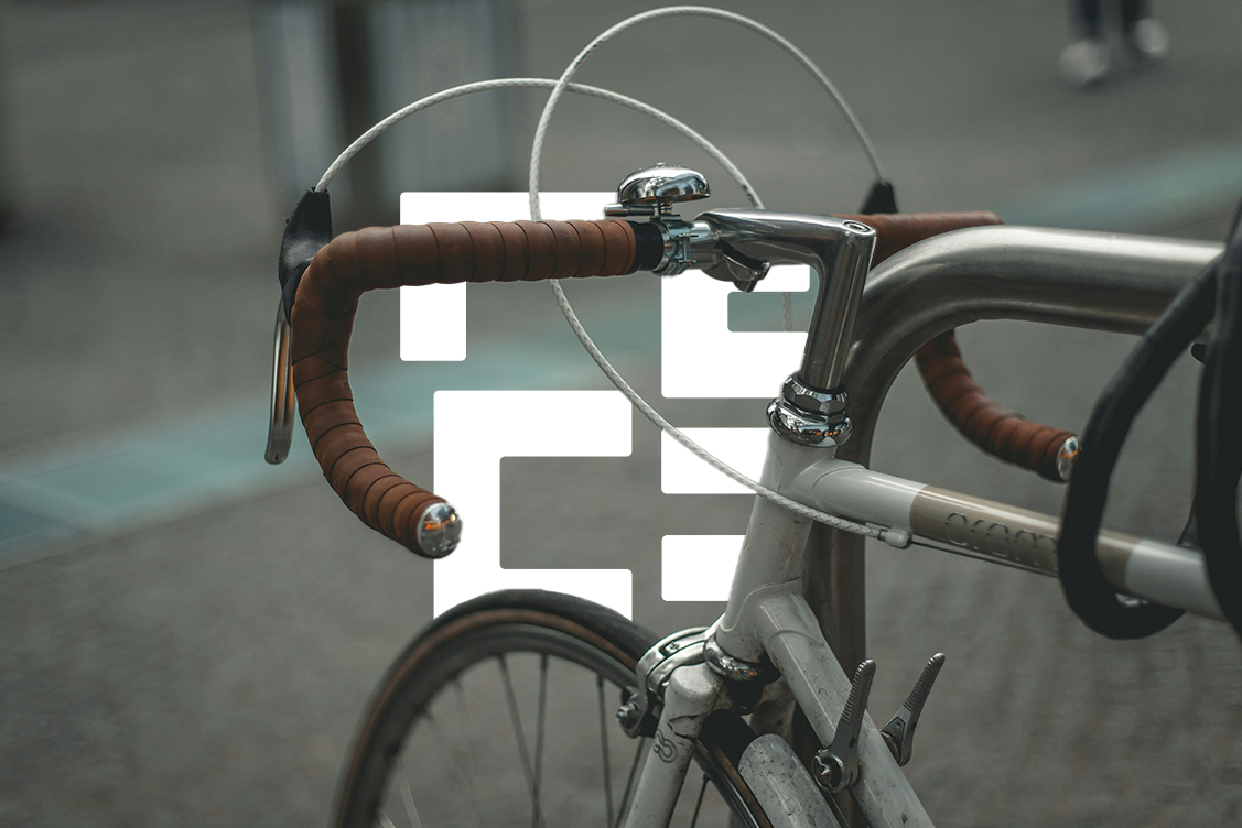 Close up of bike handle bars with Eversure logo