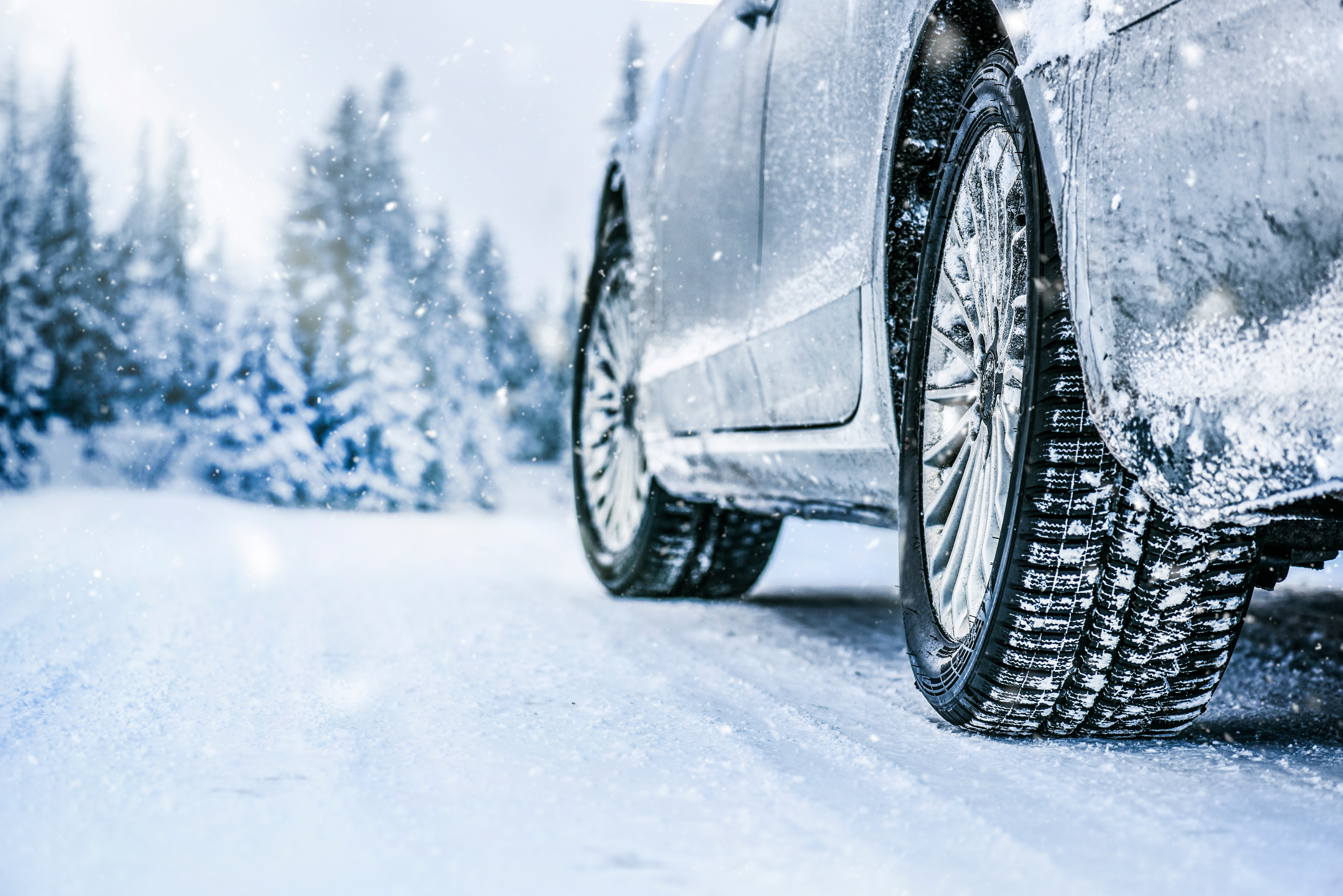 Car driving in snow