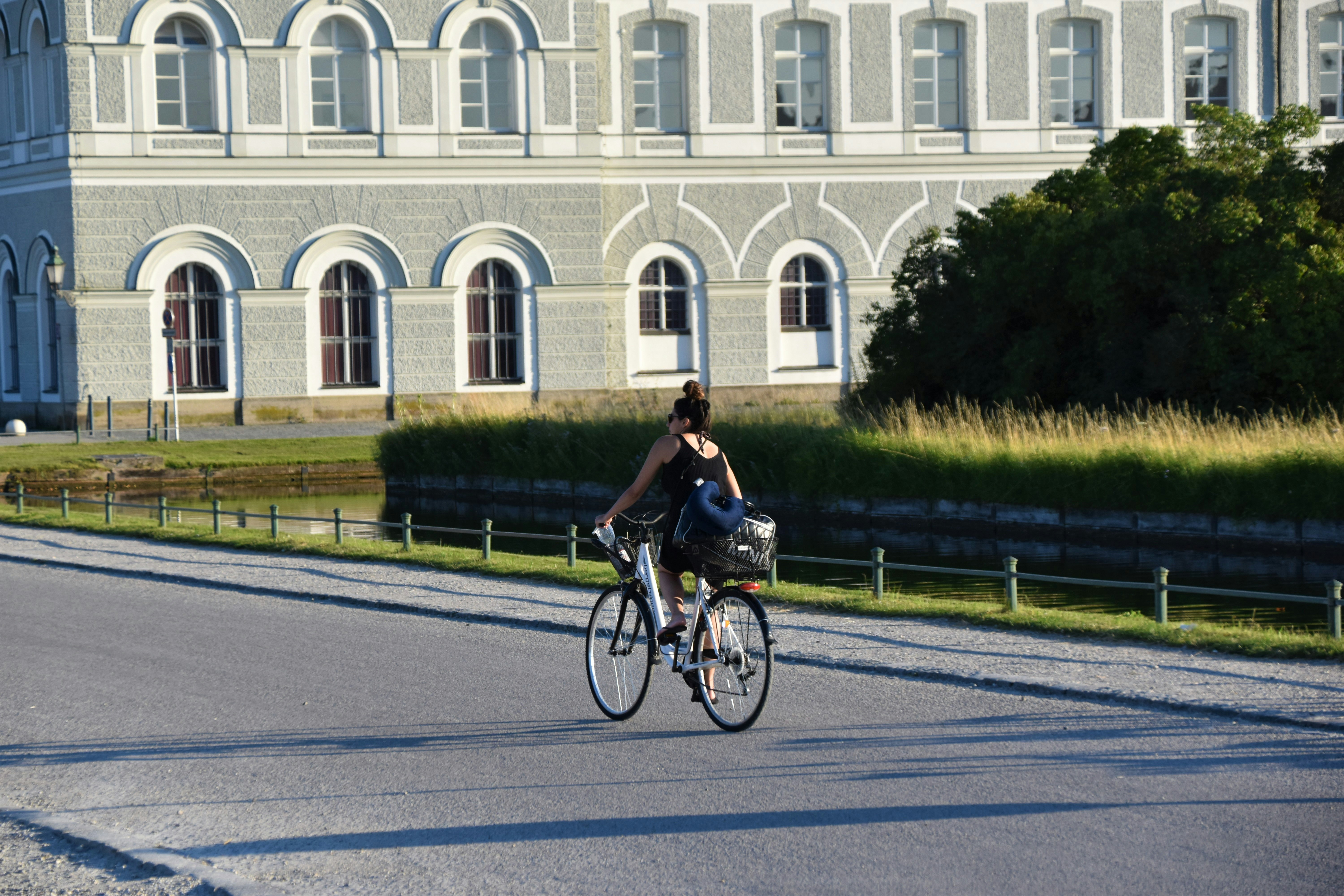 Person with bike in front of castle