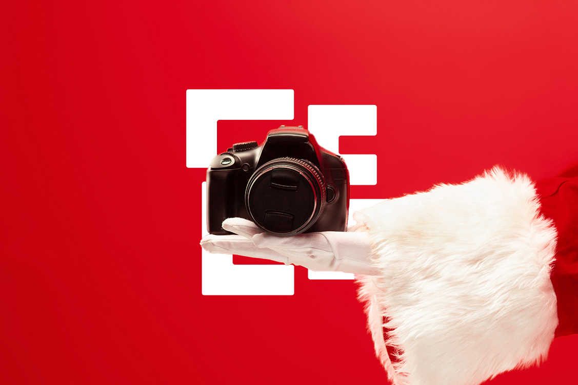 santa holding camera