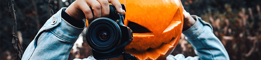 Pumpkin head with DSLR