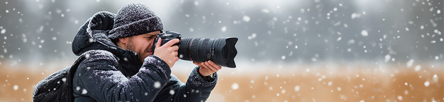 Man photographing snow