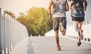 Two people running