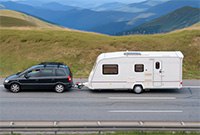 Car towing caravan