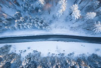 road in the middle of winter landscape